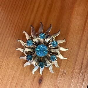 Vintage Blue Rhinestone Sunburst Brooch